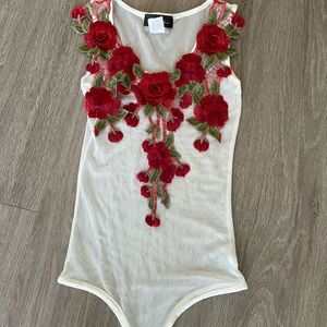 Mesh see through bodysuit with rose petal detail